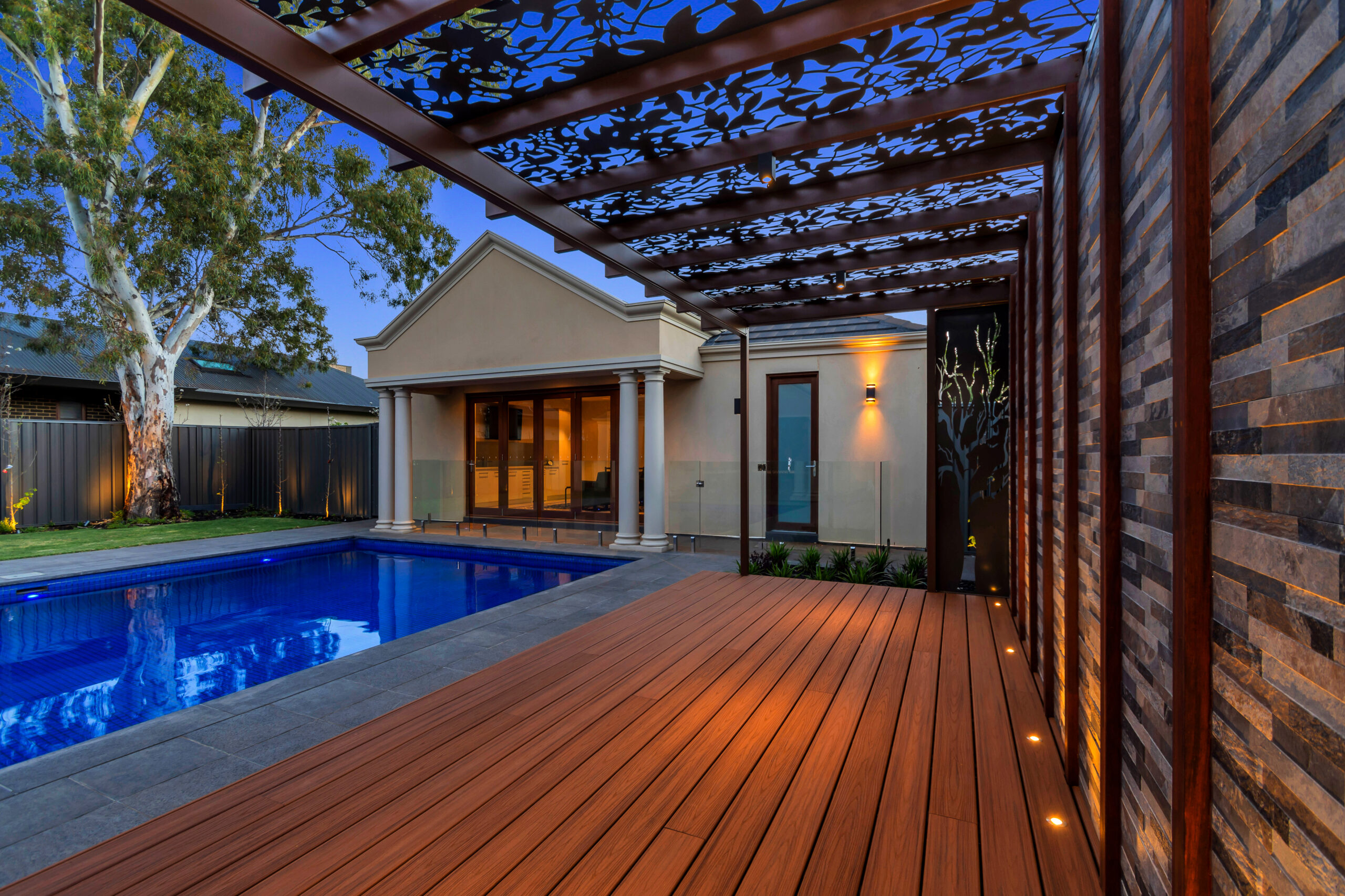 Beautiful decking by the pool in the evening